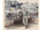 It was April 1966 and Ronald Byklum was completing his Advanced Training at Camp Pickett, Virginia. He is pictured next to a 155-Howitzer artillery gun.