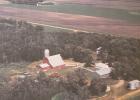 An aerial view of how the Brian and Tracy Johnson farm has changed over the last few decades! (More photos on page 3) Photos courtesy of Tracy Johnson