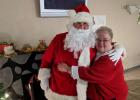 A special visitor from the North Pole even showed up and was greeted with a hug from Bonnie Nelson!