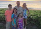 Rick and Sue Ann Sjulestad, along with their children, took this family photo at a luau in Maui, Hawaii, in March of 2015. Sue Ann says the cost to travel to Hawaii has really dropped in the last few years. To inquire, refer to her contact information in the above article.

