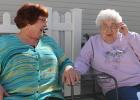 Pastor Vicki Saude-Worthington visits with Laudy Sistad at Minnesota Greenleaf Senior Living in Thief River Falls last week.