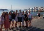 Danielle Faldet, Eileen Miller, Alise Sargent, Callie Sumner, Kayla Ehlers, Chase Voxland, Annabell Phillips, Jennifer Faldet, and Megan Godtland pictured on the island of Santorini in Greece.