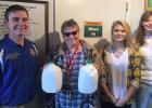Clearbrook-Gonvick FFA took part in the ten gallon challenge which is a nationwide event. Students in the picture from left to right are Tucker Lene, Julie Sten food shelf worker,  Bailey Haugan and Jacey Tronnes.
