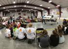 Group photo during the rollover demonstration lead by Tom Vanderwal.