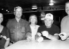 Pumpkin seeds still available for the contest. Pumpkin growers are shown from left to right: Kim Solberg, Al Danielson, Margie and Tucker Johnson and Bob Edevold.
