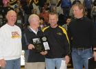 Former players, students and colleagues had a brief recognition for Coach Philion on Friday, February 24th, at the home game where the Clearbrook-Gonvick Bears hosted his Red Lake County Rebels.   From Left to Right: Rocky Eck, Steve Philion, Dylan Goudge, and Peter Imle. Rocky, Dylan, and Peter presented Coach Philion with a plaque to represent the lives that he has touched by coaching for so many years. Photo by Kendehl Ballard