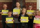April Elementary Students of the Month Pictured in Front Left to Right: Quincy Gustafson, Xylah Rivkind, Peyton Wittenberg. Pictured in Back Left to Right: Dylan Dahlke, Abby Engen, Matthew Rankin, Not pictured: Kysen Larson